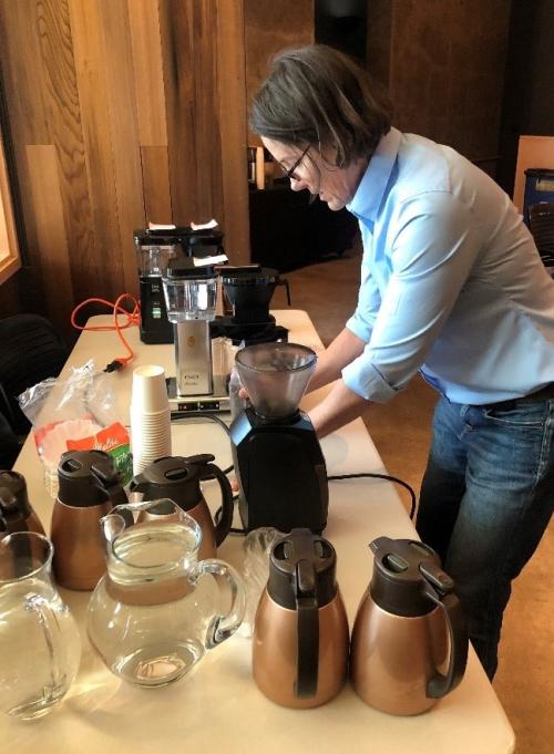 Tonya Kuhl preparing coffee at event